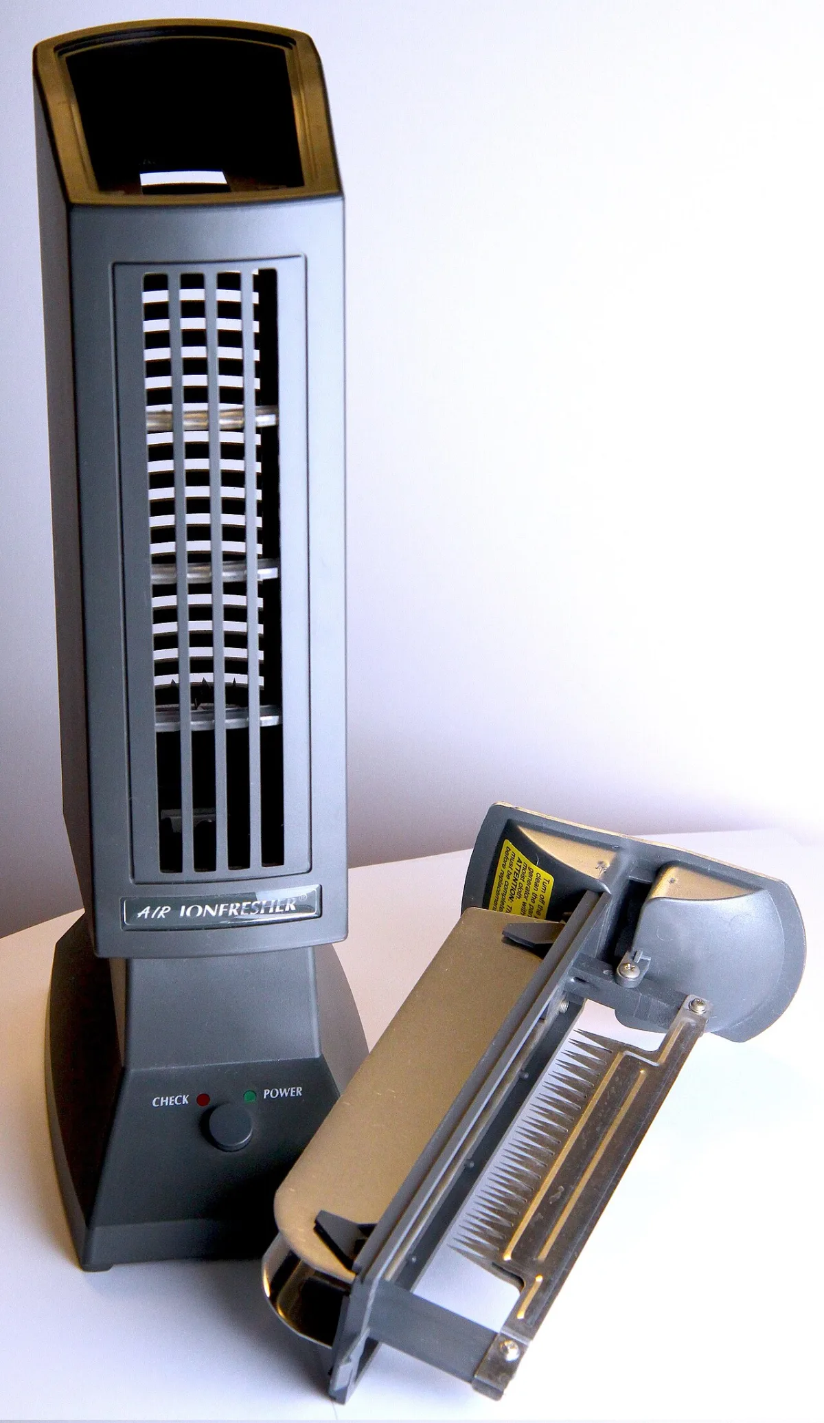 Tower air ionizer with its corona discharge electrode and metal collection plates pulled out
